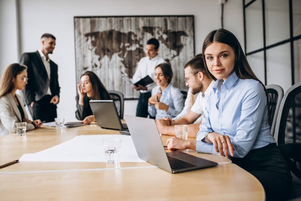 group-people-working-out-business-plan-office